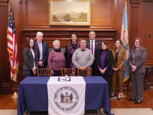 2025 Outstanding Service Award Recipients, DV Intervention Providers from People's Place II, with DVCC Chairs, Governor Meyer, AG Jennings and Rep. Griffith